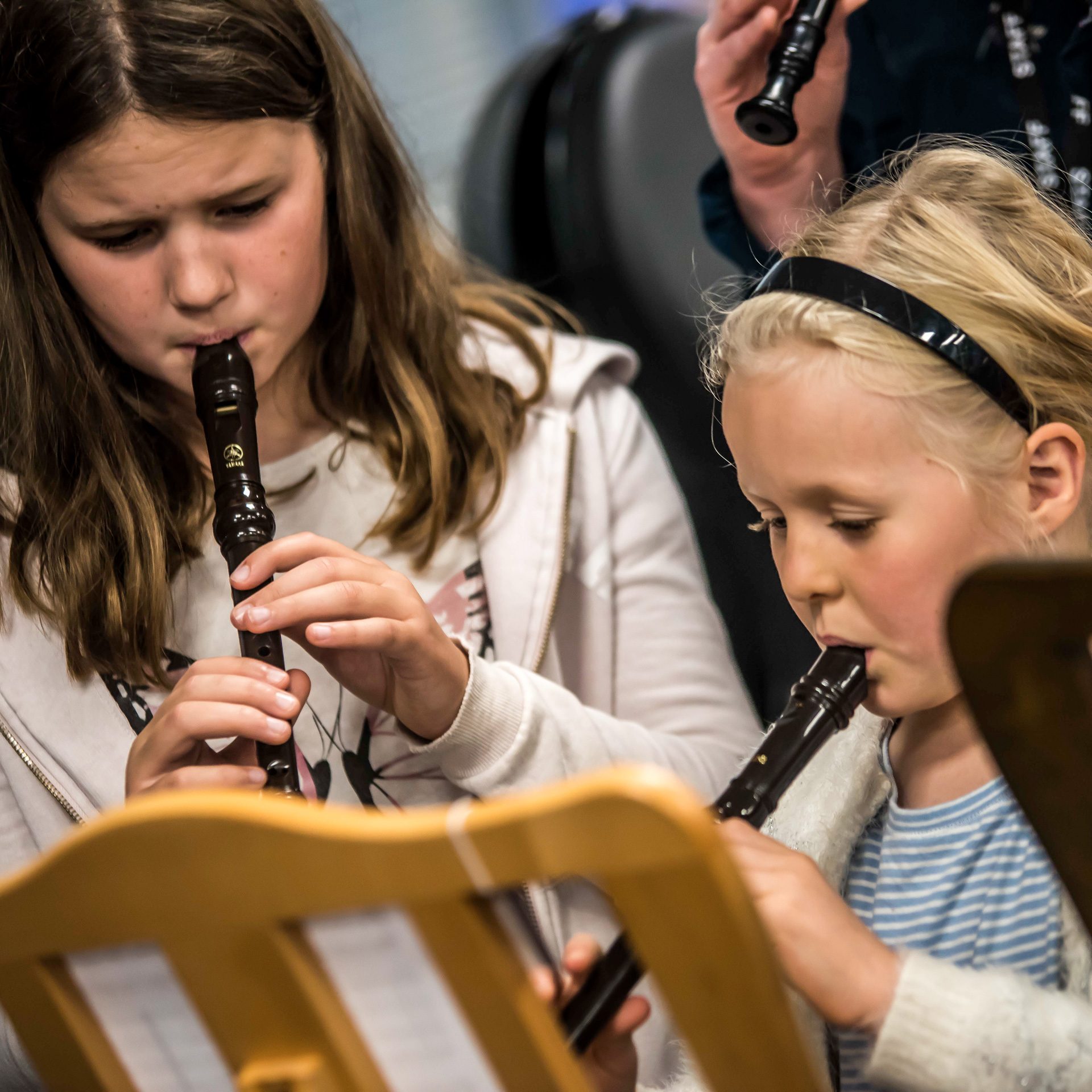 Two Minster Minstrels playing flutes Two Minster Minstrels playing flutes